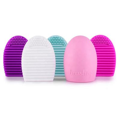 China Eco-friendly Face Egg Shaped Egg Facial Brush And Egg Hair Brush Silicone Brush for sale