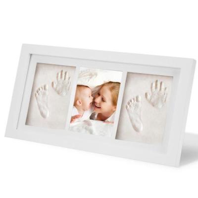 China 2pcs Indoor Classic Clay Baby Handprint Frame DIY Photo Foot and Footprint Picture Photo Frame for Newborn Baby for sale