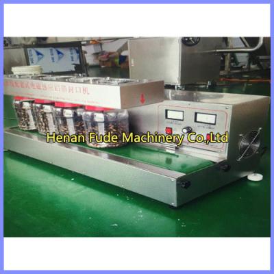 China peanut butter bottle sealing machine, chilli sauce bottle sealing machine for sale