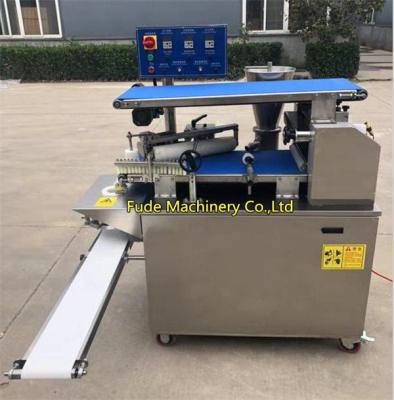 China Automatic baozi machine, steamed bun machine, pie cake machine, momo machine for sale