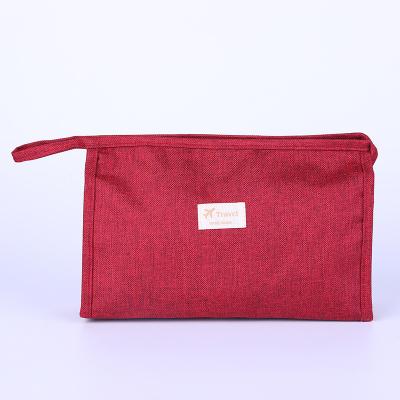 China Custom Laminated Cotton Travel Makeup Bag Wholesale Gift Bag High Quality Laminated Canvas Make Up Cosmetic Bags for sale