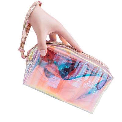 China Large Capacity Bright Color TPU Multi-Function Small Color Laser Wash Bag Transparent Portable Magic Cosmetic Magic Dustproof Shockproof Storage Bag for sale