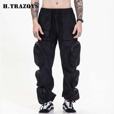 China Custom Six Pocket Zipper Drawstring Streetwear Fashion Outdoor Anti-pilling Wear-resistant Men's Pile Cargo Pant for sale