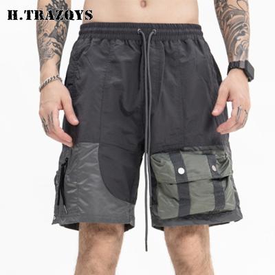 China QUICK DRY OEM Many Custom Mens Pockets Color Block Nylon Cargo Shorts Fashionable for sale