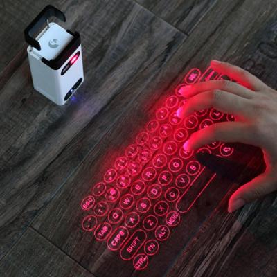 China Hot Selling Optical Laser Virtual Projection Keyboard Wireless Projection Keyboard For Mobile Phones for sale