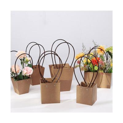 China Hot Seller Biodegradable Wholesale IMEE Waterproof Packaging Paper Bag For Florist Material Flowers Holder Flower Trapeze Flower Packaging Bag for sale