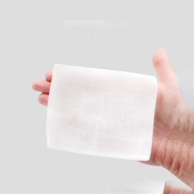 China SJ Cotton Absorbent Dressing Gauze Medical Grade Pad Swab Factory Manufacturing Cotton Gauze Swab for sale