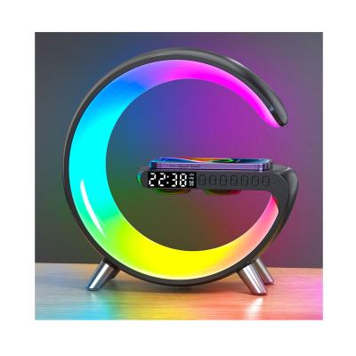 China Multifunctional Creative Alarm Clock Mobile Phone Night Light Table Lamp Gift Wireless Charger with Speaker Night Light Radio Colorful Charger for sale