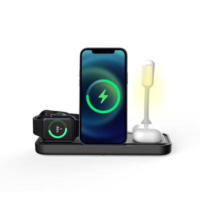 China New Design Safe Convenient Desktop 15W Qi Multifunctional Fast Wireless Charger 4 in 1 Wireless Charging Station for sale