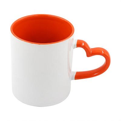 China Viable Sublimation Mask 11oz Logo Heart Handle Mug Cup Made To Order Ceramic for sale