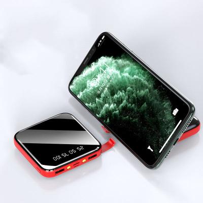 China Wholesale 20000mAh Mini Powerbank With Phone Holder Factory Portable Mirror Power Bank Mini Powerbank With Phone Holder 10000mAh Flashlight Battery for sale