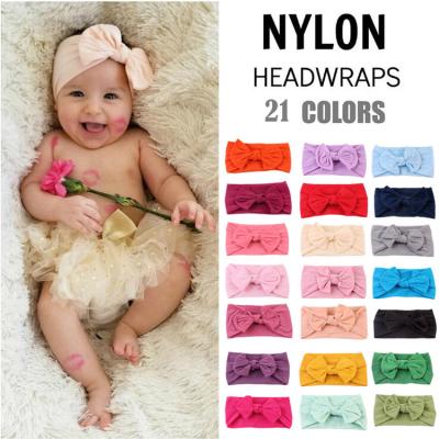 China Hot Selling Wholesale 22 Styles Bowknot Bowknot Macarons Hair Tie Baby Headband Cute Hair Accessories Nylon Headbands With Bow for sale