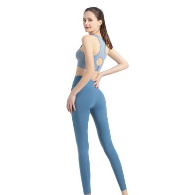 China Breathable Light Blue High Waisted Yoga Leggings And Tight Sports Bra Compression Set Gym Pants Wear Sexy Women Fitness Sets for sale