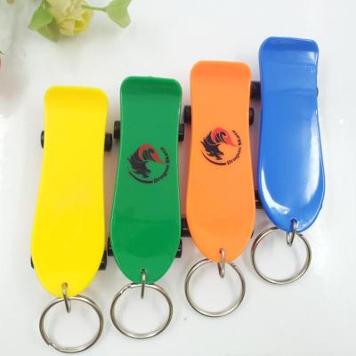 China Promotional ABS plastic finger skateboard with key chain, finger scooter for sale for sale