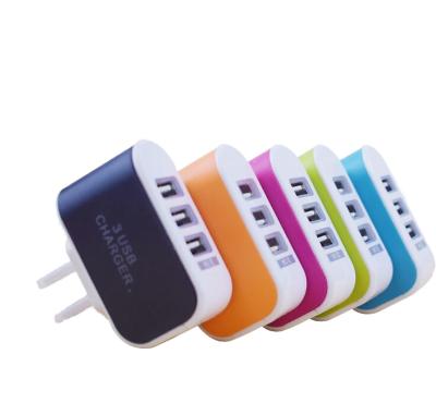 China Universal Home Glow In The Dark 3 Ports Travel Essential USB Charger for sale