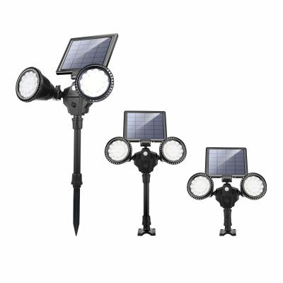 China Garden IP65 waterproof solar outdoor courtyard double head spotlight human body induction solar lawn light wall light for sale