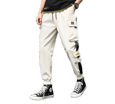 China Anti-Wrinkle Europe Joggers Pants With Side Pockets Designs Plus Size Shaping Sweat Cheap Track Pants Mens Cargo Pants for sale