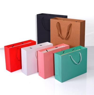 China Recycled Materials Kraft Paper Bag With Handle Paper Bags For Food Takeout Clothing Colored Brown Paper Tote Bag for sale