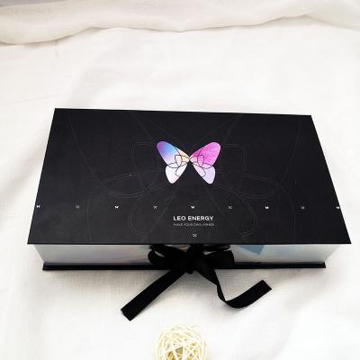 China Handmade Custom Logo Laser UV Coating Luxury Paper Box Knock Down Top Gift Boxes With Black Ribbon for sale