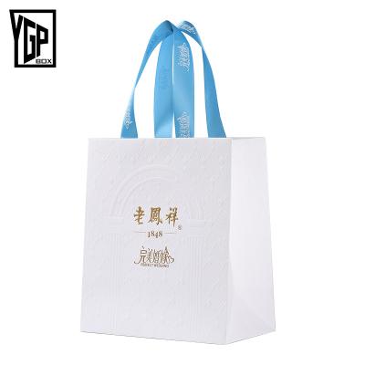 China Recyclable Custom Design Luxury Jewelry Packaging Handbag Shopping Bag Sliver With Logo for sale