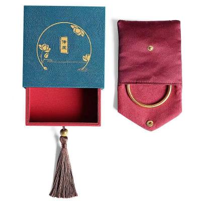 China Specialtypaper+Plastic+velvet custom logo printed antique gold drawer tassel jewelry box with velvet bag for sale