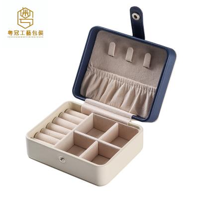 China Newest Popular Exquisite Earring Small And Portable Mini Jewelry Box Necklace Ring Bracelet Jewelry Storage Box Travel for sale