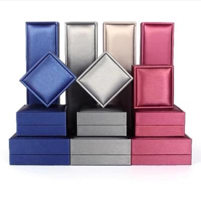 China Plastic+leather+velvet Newest Design Good Quality Luxury Jewelry Storage Box Packaging for sale