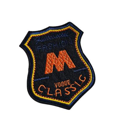 China Viable Wholesale Custom Logo Custom Iron On Patches Garment Fabric Woven Badge Embroidery Patches for sale