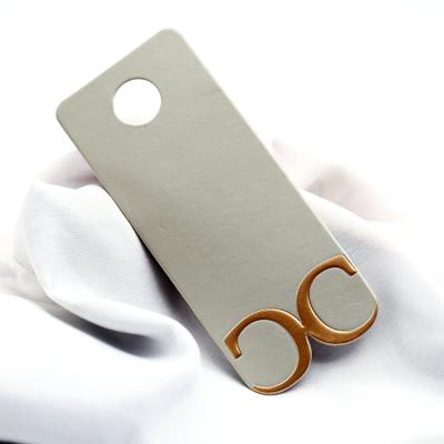 China Sustainable Custom Embossed Clothes String Plastic Garment Seal Rope Punch Label Clothes Printing Hang Tag for sale