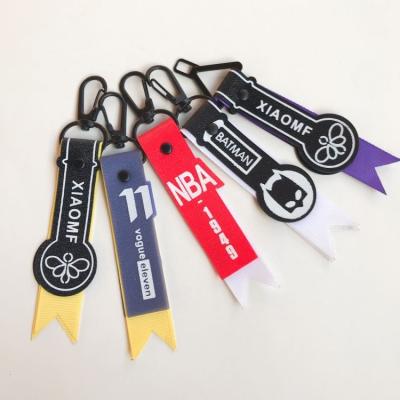 China Factory Custom Soft Feel Fabric Plastic Easy Clean Durable Type Material Wristband Webbing PVC Key Chain For Bag for sale