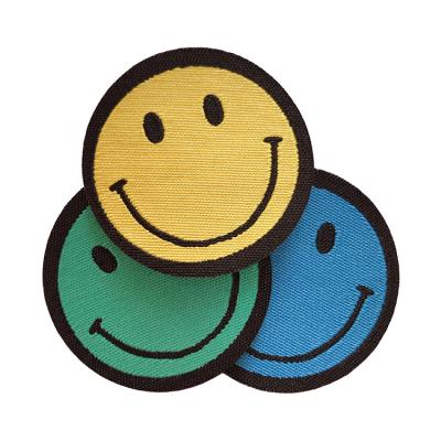 China Handmade Hot Sale Custom Sew-on Smiley Shape Woven Circular Patch Badges For Uniforms Clothing for sale