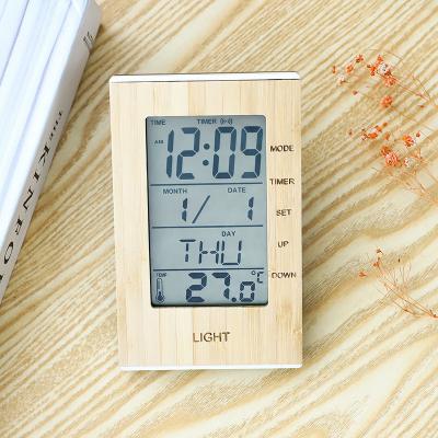 China Art Deco Amazon Specialty Clocks 2023 Led Nixie Wood Clock Decorations Desk Digital Pendulum With Temperature And Humidity for sale