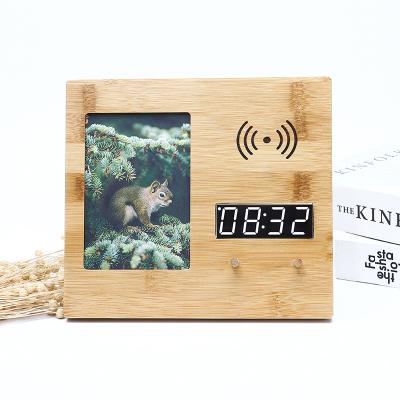 China Art Deco Amazon Trending Alarm Clock Word Clock Office Decorations Wireless Multifunctional Led Wooden Clock With Picture Frame for sale