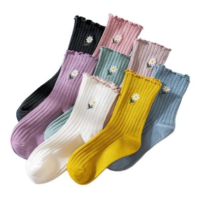 China Custom QUICK DRY Crew Socks Autumn Tube Trend Embroidery Women Daisy Socks Cute Casual Ribbed Ladies Socks for sale