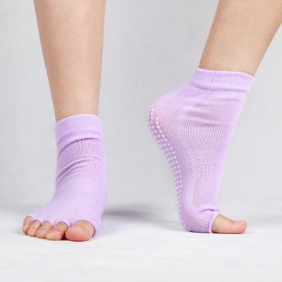 China Wholesale Antibacterial Women's Comfortable Toe Foot Aligner Booties Massage Yoga Gym Half Toe Socks for sale