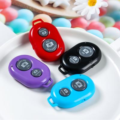 China Wholesale Mini Wireless Mobile Phone Switch Blue Tooth Shutter Buttons Remote Control For Tripod Remote Control 48MM*30MM* 10MM Camera for sale