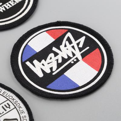 China Sustainable New Fashion PVC Printing Woven Labels For Apparel Garments for sale