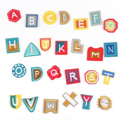 China Viable Custom Alphabet Letter Embroidery Patches Cute Cartoon Small Iron-on Embroidered Patch for sale