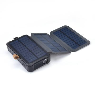 China Outdoor Indoor Dynamo Folding Hand Solar Power Bank Monocrystalline Solar Charger Include 2 USB Outputs for sale