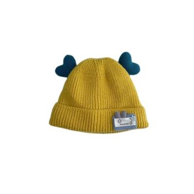 China Autumn And Winter Baby Woolen Hat Fashion Cute Doll Care Eco-friendly Warm Knitted Hat For Children for sale