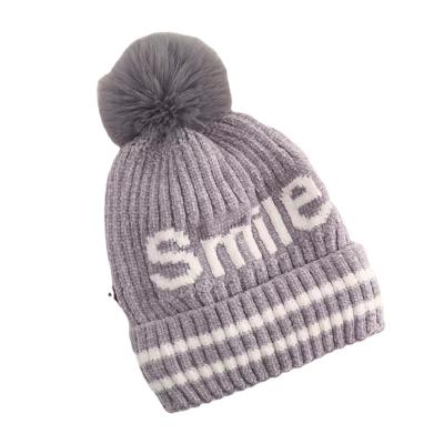 China 100g Chenille Jacquard COMMON Smile Hot Fashion Knit Hat Supports Customization for sale