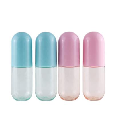 China 40ml 60ml 100ml PET Cosmetic Bottle Cap Macaron Color Pill Plastic Capsule Shaped Blue Pink Spray Pump Cosmetic Bottles for sale