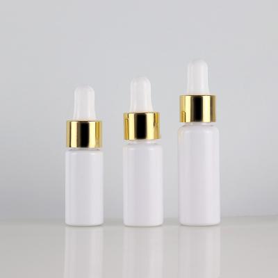 China 10ml15ml20ml Transparent And Colorful Plastic Medicine Essential Oil Bottle With Gold Silver Cap for sale