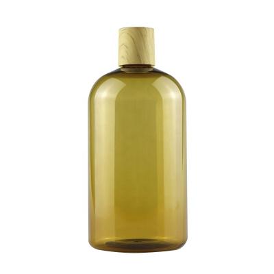 China BEAUTY PACKAGING 500ml Champagne Pet Shampoo Bottle With Top Cap And Bamboo Disc Plug for sale