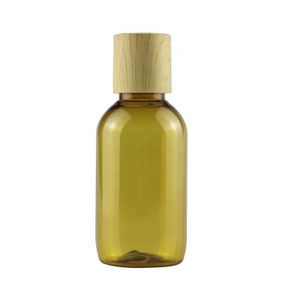 China BEAUTY PACKAGING 90ml Champagne Pet Shampoo Bottle With Bamboo Disc Top Cap for sale