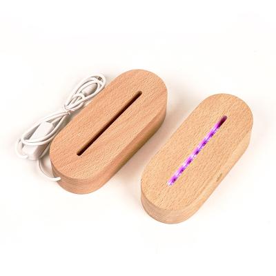 China Eco-friendly diy 3d led night lamp wooden led lamp base round wooden led lamp base usb cable switch for sale