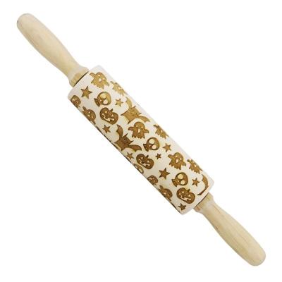 China Sustainable Rolling Pin Christmas Wood Engraved 3D Embossed Pin With All Saints Day Pattern for sale