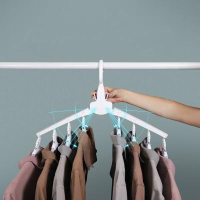 China Amazon Hot Seller Household Eco-friendly Material Foldable Magic Hanger, Multifunctional Retractable Wide-shoulder Non-slip Clothes Drying Rack for sale