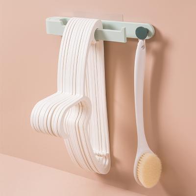 China Multifunctional PE Mop Hanger Mop Wall Hanging Bathroom Hook Storage Dot Holder Single Polygon No Staple Minimalist Nail Free for sale