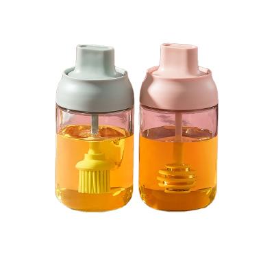 China Viable High Placed Cover Products Honey Glass Seasoning Sealing Bottle Scoop for sale